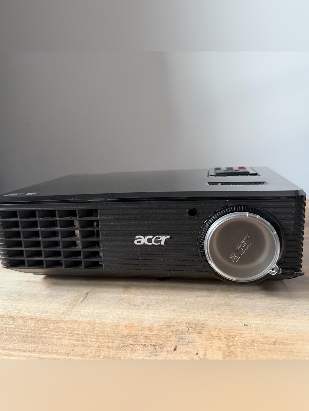Acer Black Compact Projector with Silver Lens Cap